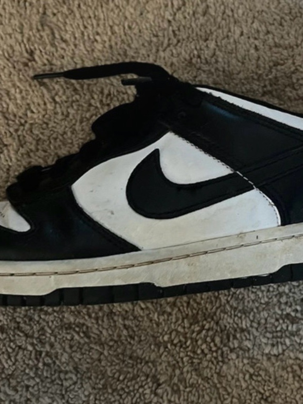 Nike Women's Black and White Low-Top Swoosh Sneaker
